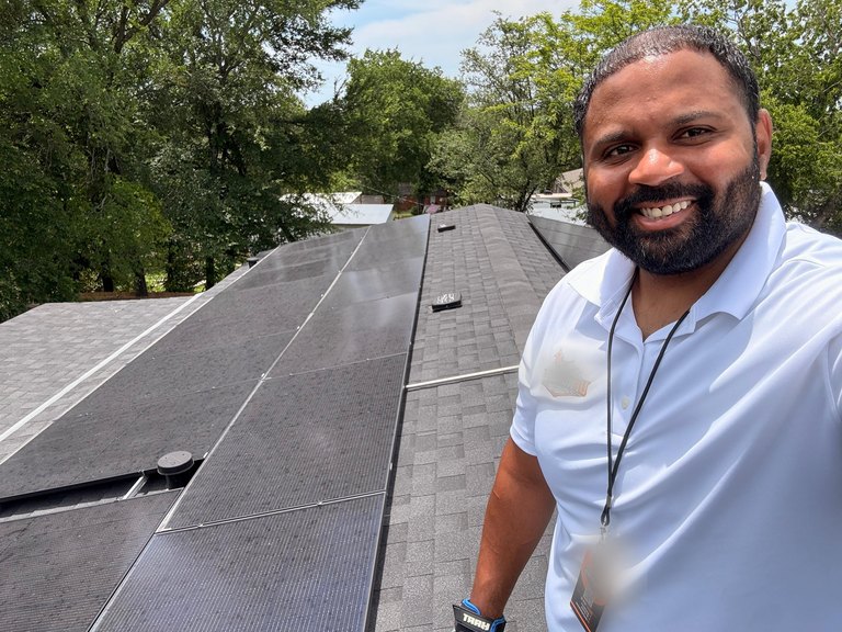 Chris on a NJ rooftop install — independent solar & roofing broker